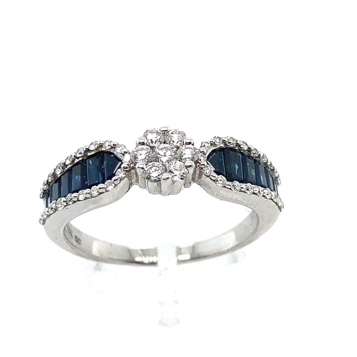 14 k white gold  Engagement Sapphire ring with a beautiful diamond.