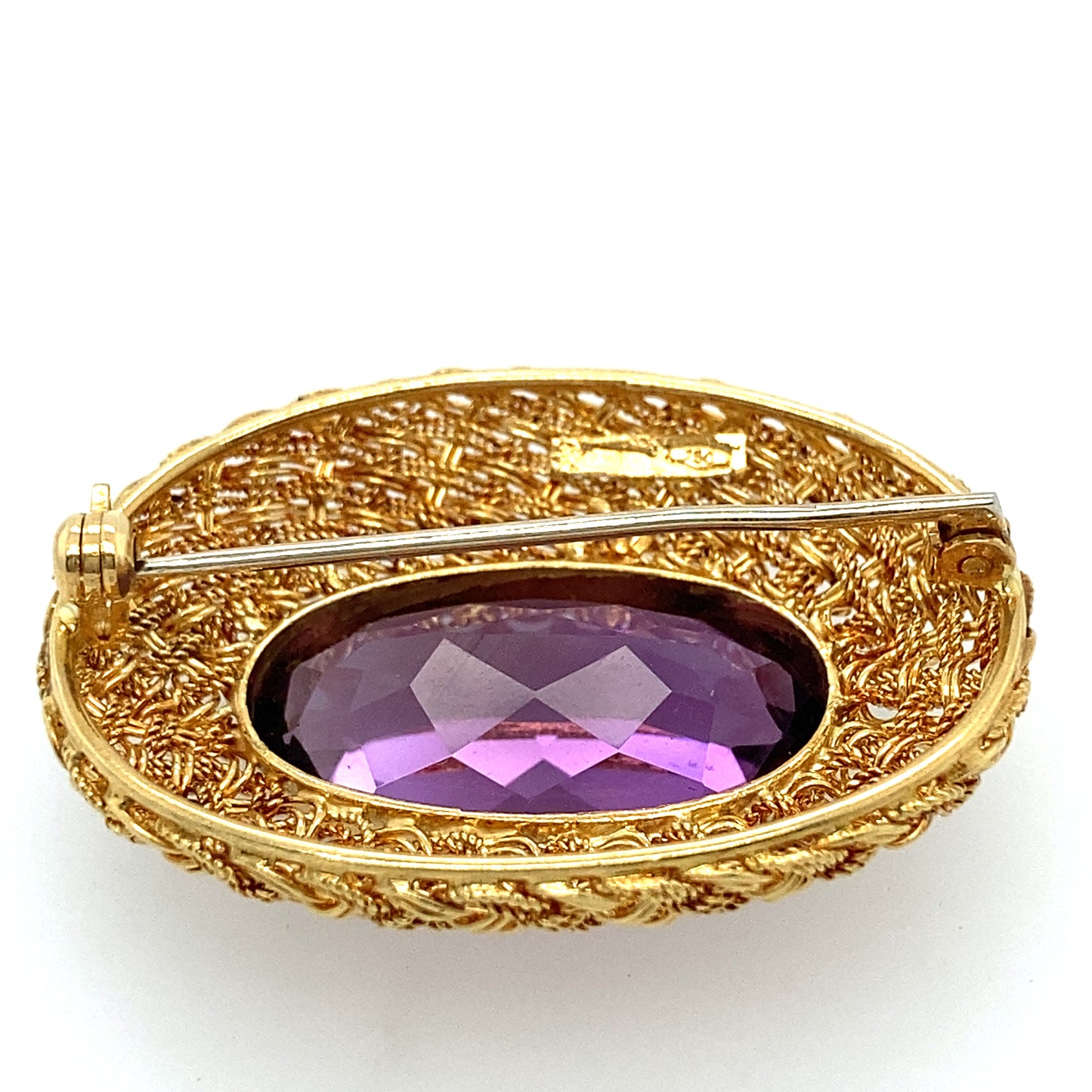 18k yellow gold pin and pendant with  a dark purple color Amethyst stone.