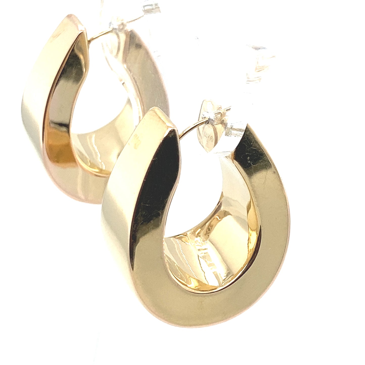 14 k yellow gold hoop earring from Italy.