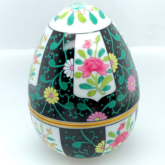 Herend from Hungary. Egg porcelain figurine, hand painted designed with gold.