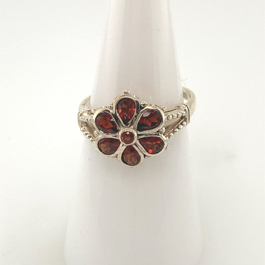 Sterling Silver 925 Rhodium plated Ring with garnet stone.