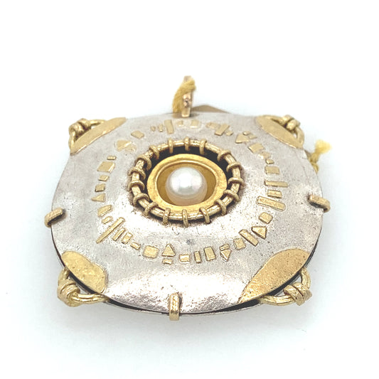 Designer pendant Sterling Silver with 22k yellow gold combination. Middle of the pendant south see pearl.