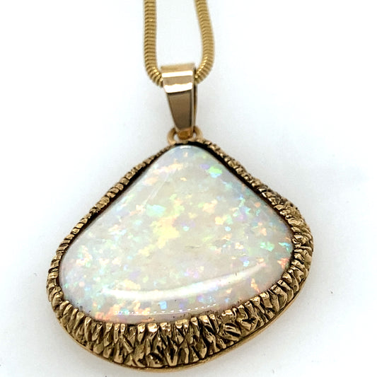 14 k white gold pendant with a huge fire opal stone. Beautiful vintage art deco pice.
