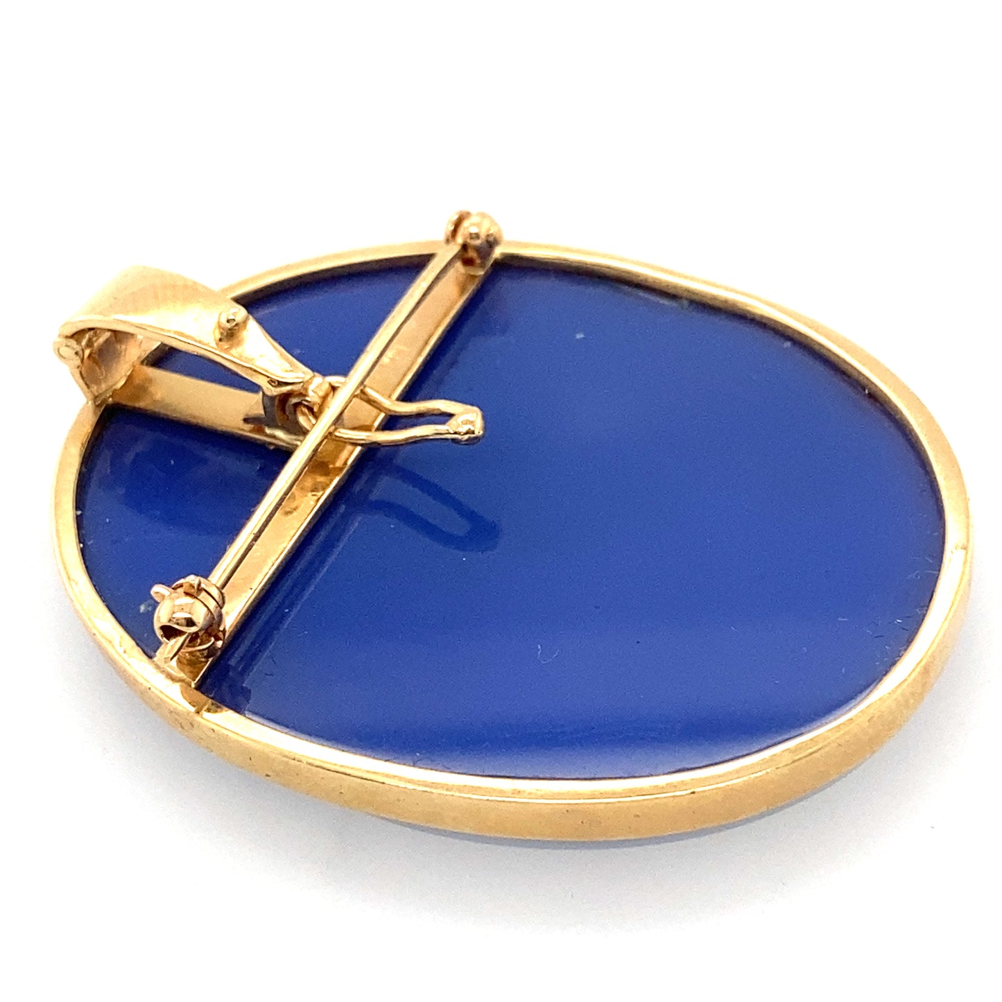 14k yellow gold frame into a beautiful blue color cameo. Gorgeous art work.