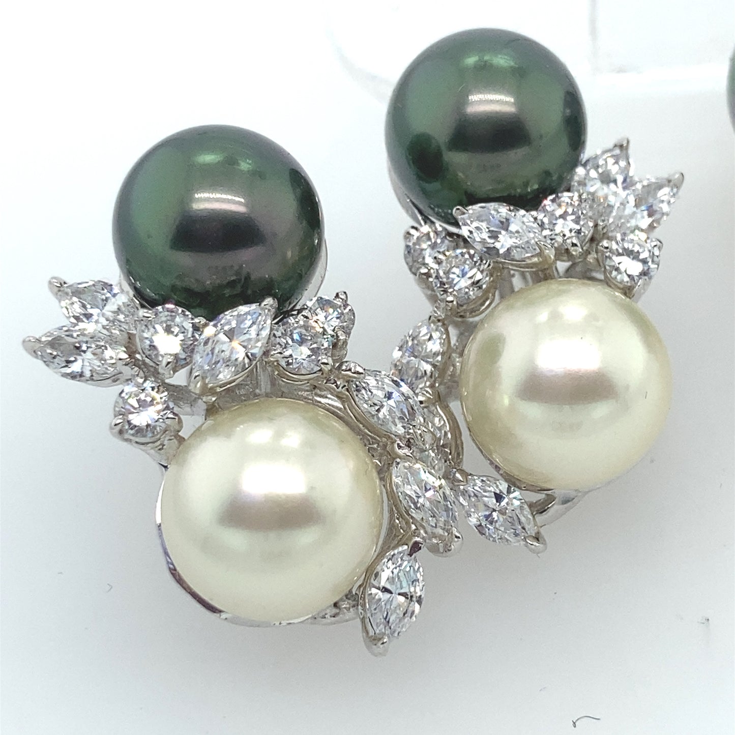 925 Sterling Silver elegant  costume pearl earrings, decorated with cubic zirconia.