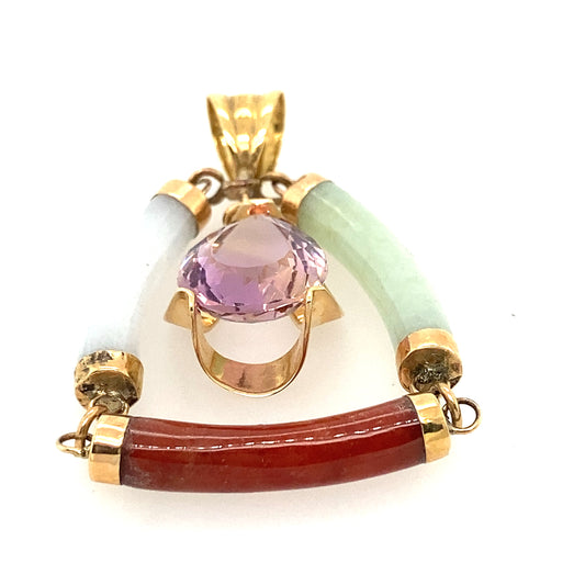 14 k yellow gold pendant. Middle of the stone is Amethyst , around the Amethyst 3 different colors jade.