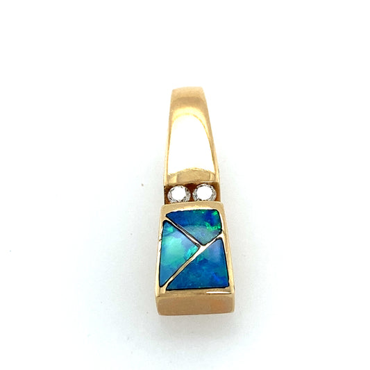 14k gold pendant with blu tone color fire opal stone. Up to the stone 2 pc good quality diamond .