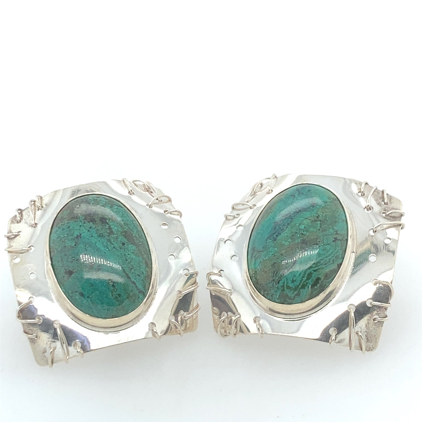 Sterling Silver designer earrings with turquoise stone. Clip earring but we can repair for pierced.