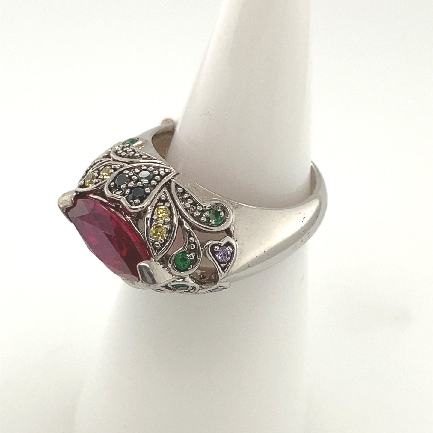 Sterling Silver 925 Rhodium plated Ring with Ruby color crystal stone.