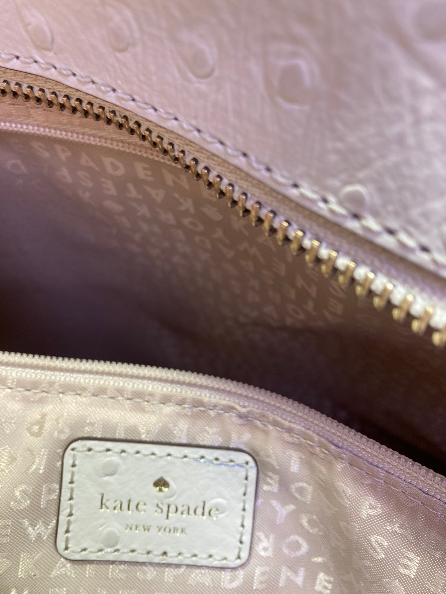 Kate Spade Designer Handbag leather beige color.