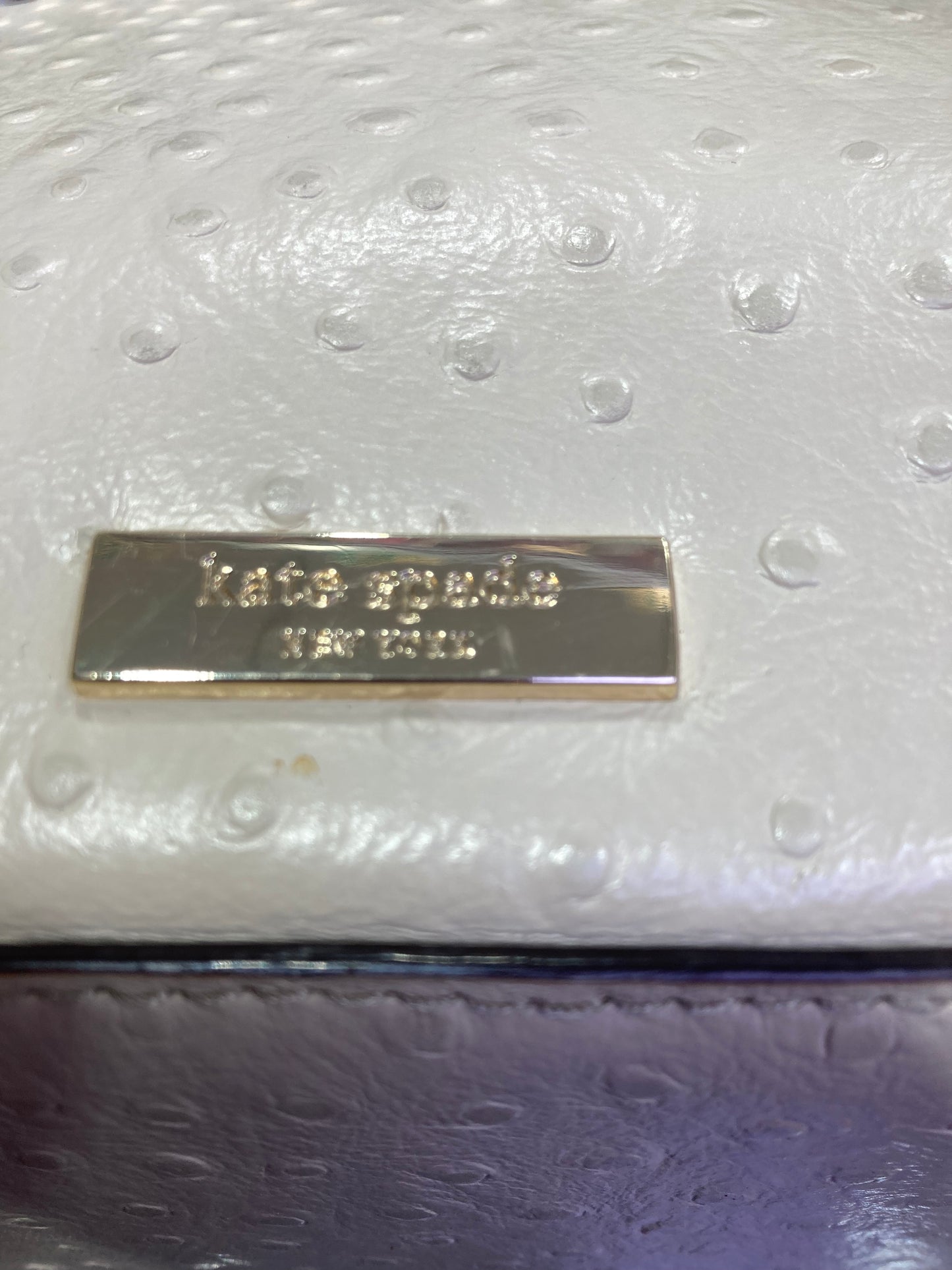 Kate Spade Designer Handbag leather beige color.
