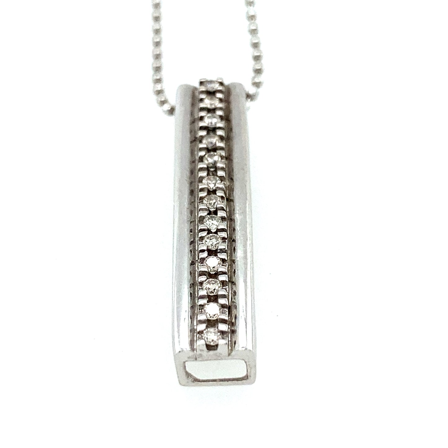 14K white gold necklace with white gold pendant and small diamonds.