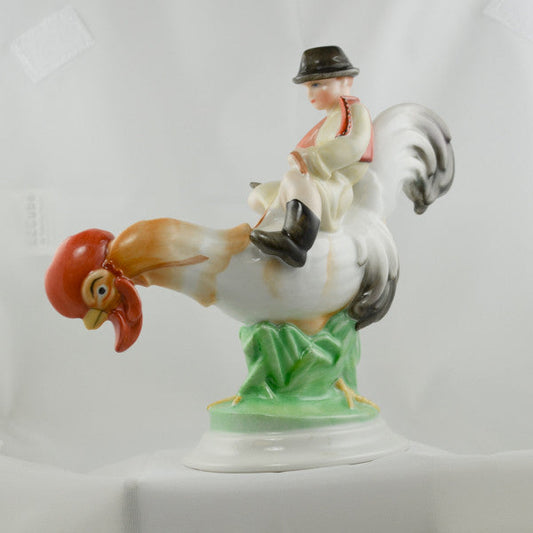 HEREND figurine from Hungary Boy Riding Rooster hand painted.
